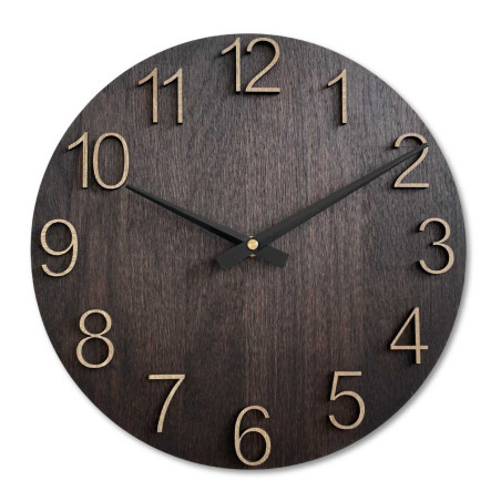 Round wooden clock with a subtle natural motif and legible numbers.