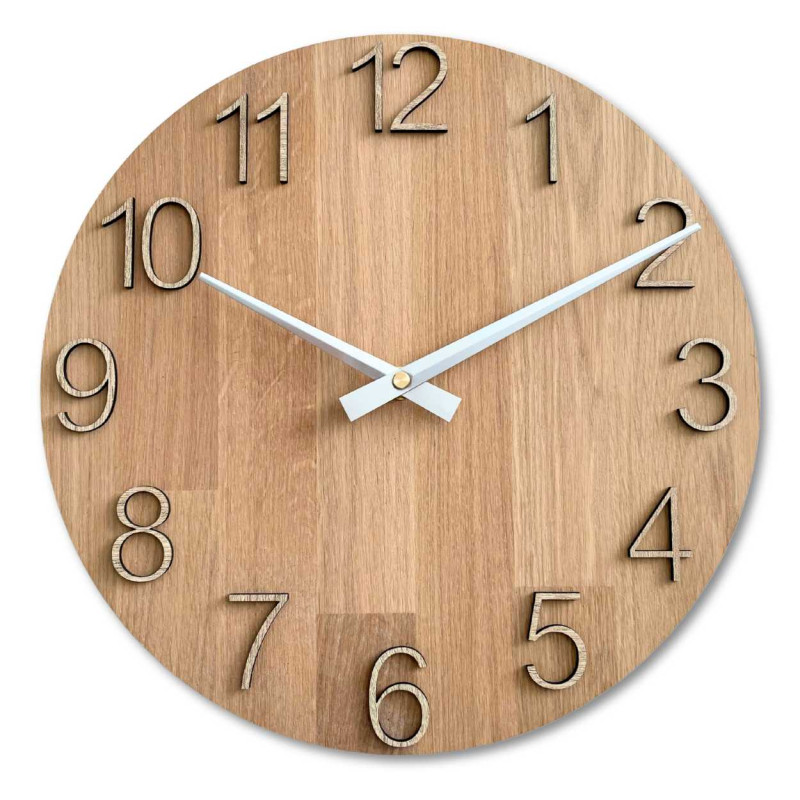 Round wooden clock with a subtle natural motif and legible numbers.