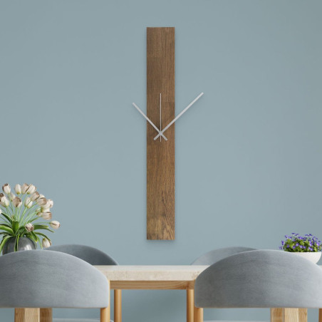 Modern wall clock made of wood in black with Arabic numerals.