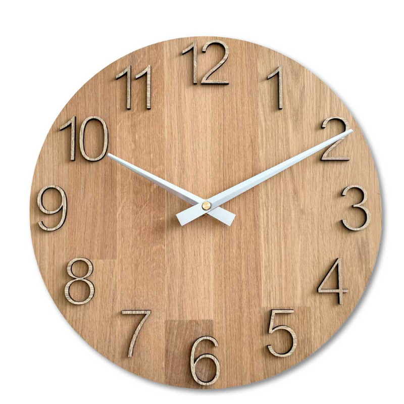 Carved wooden clock with a simple dial and minimalist design.