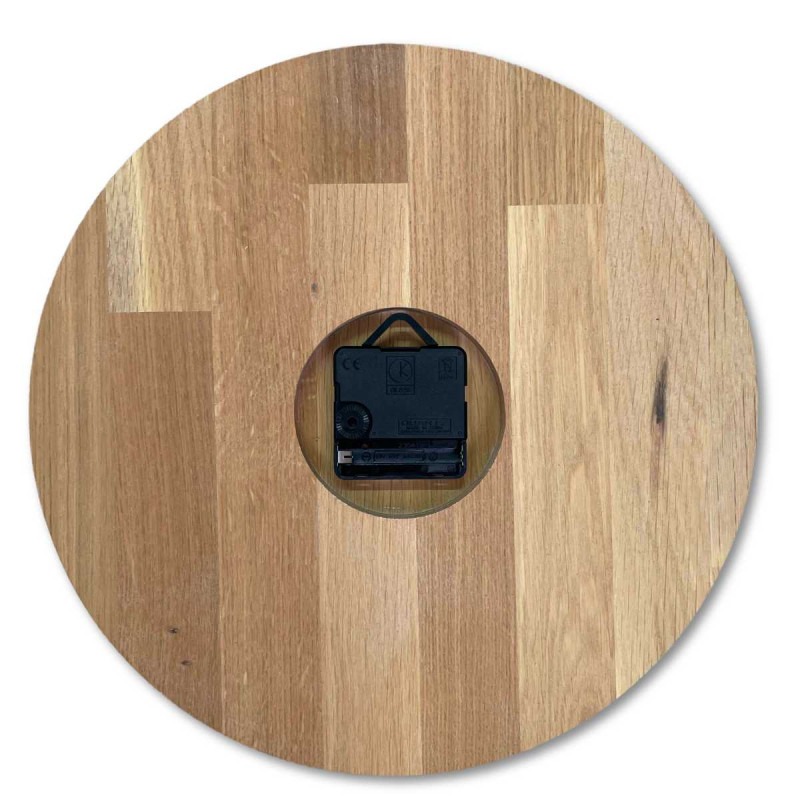Natural wooden clock with a simple design and thin hands.