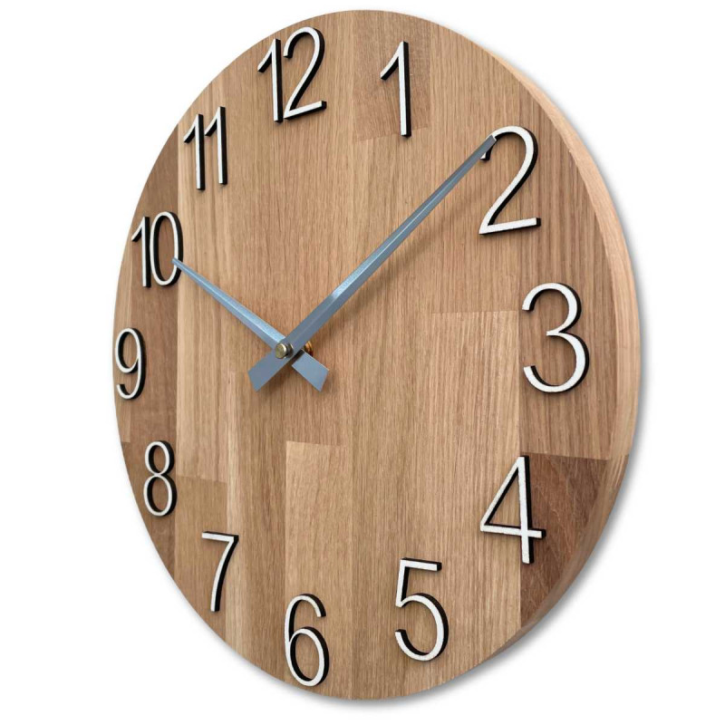 Natural wooden clock with a simple design and thin hands.