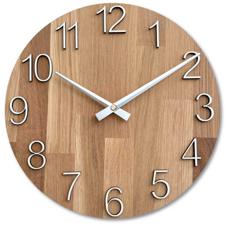 Carved wooden clock with a simple dial and minimalist design.