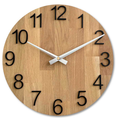 A shot of a clock face made of wood with a clean and simple look.