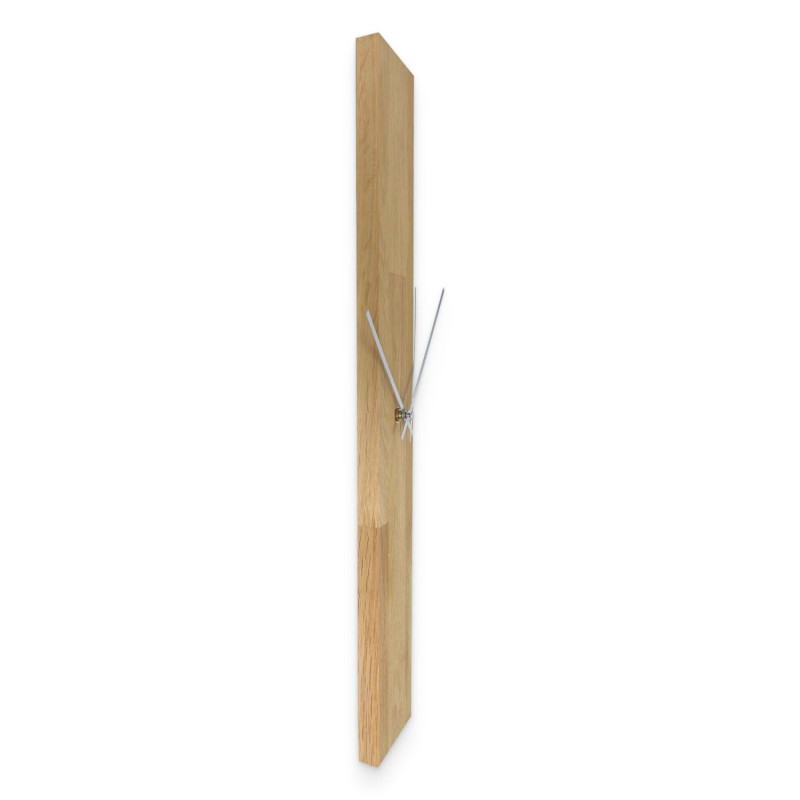 Wooden clock with a simple design and black hands on the wall.