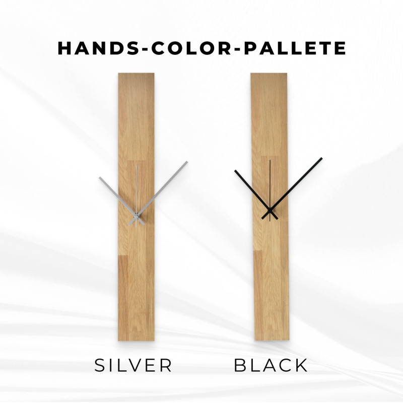 Wooden clock with a simple design and black hands on the wall.