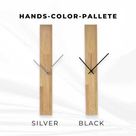 Wooden clock with a simple design and black hands on the wall.