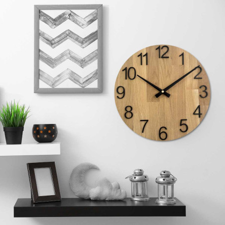 Carved wooden clock with a simple dial and minimalist design. Carved wooden clock with a simple dial and minimalist design.