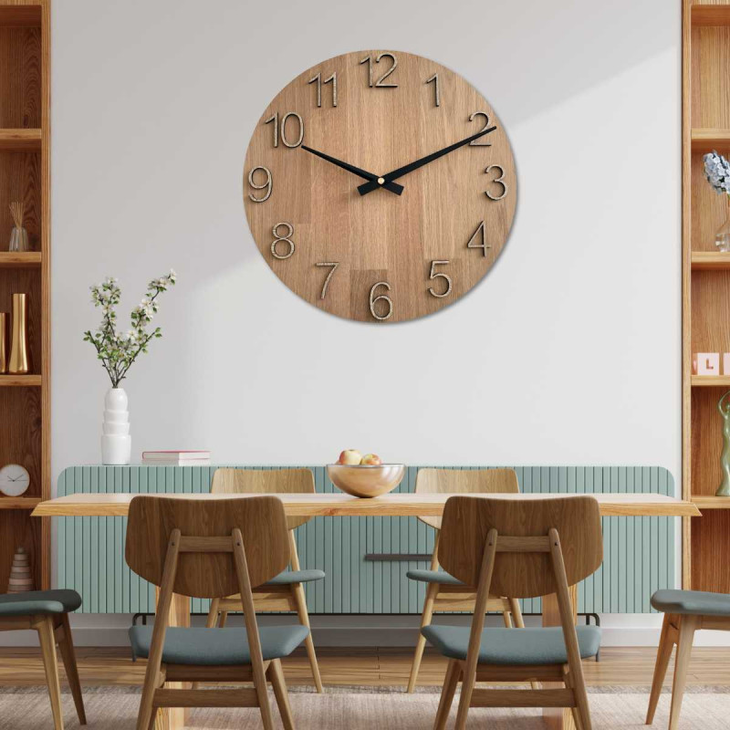 Wooden clock with a symmetrical shape and a cutout inspired by motifs from nature.