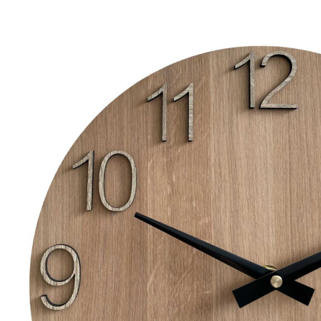 Natural wooden clock with a simple design and thin hands.