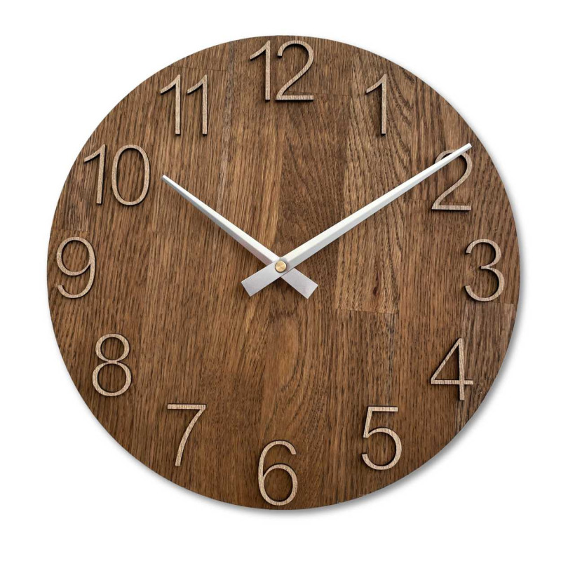 Wooden wall clock with a circular shape and a subtle natural motif.