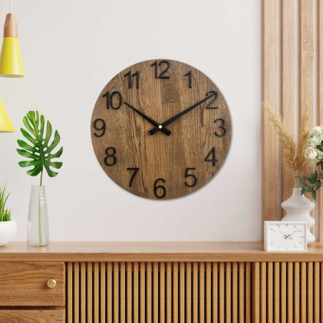 Clock made of solid wood with engraved numbers and a natural pattern.