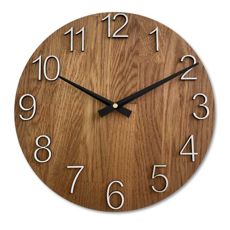 Carved wooden clock with a simple dial and minimalist design.