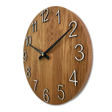 Wooden wall clock with visible material structure and smooth surface.