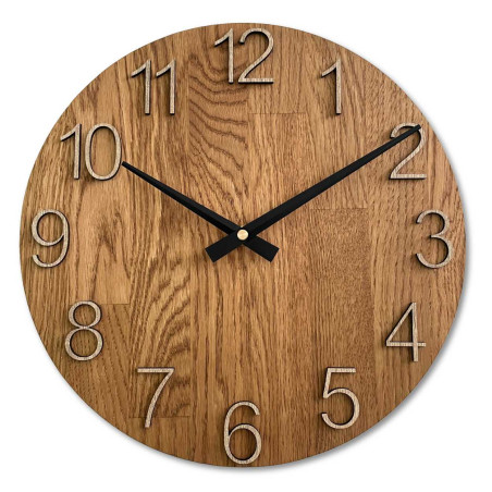 Clock made of solid wood with engraved numbers and a natural pattern.