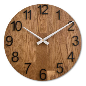 Clock made of solid wood with engraved numbers and a natural pattern.