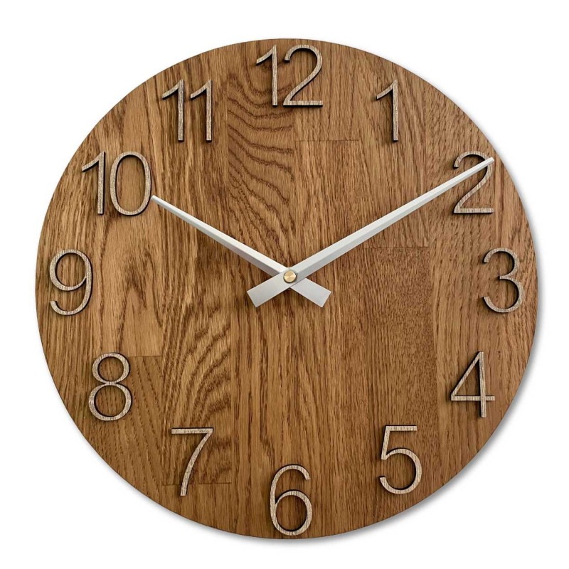 Wooden wall clock with a circular shape and a subtle natural motif.