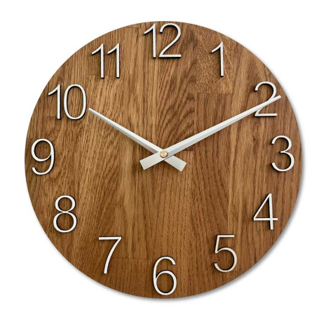 Clock made of solid wood with engraved numbers and a natural pattern.