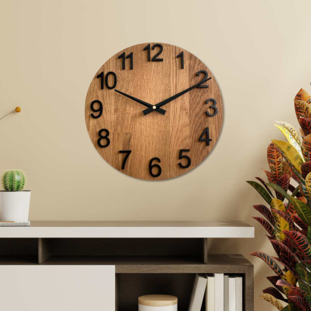 Simple modern wall clock in a circular shape Simple modern wall clock in a circular shape