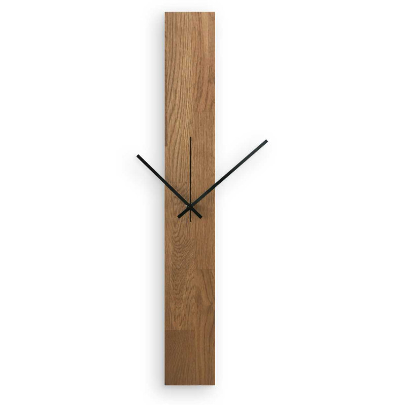 A clock made of natural wood with a distinctive pattern and contrasting silver and black hands.