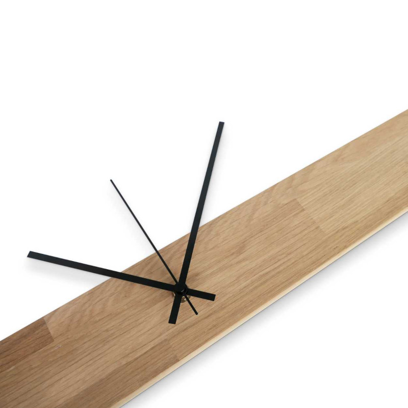 Minimalist wooden clock with a central axis and a clean design