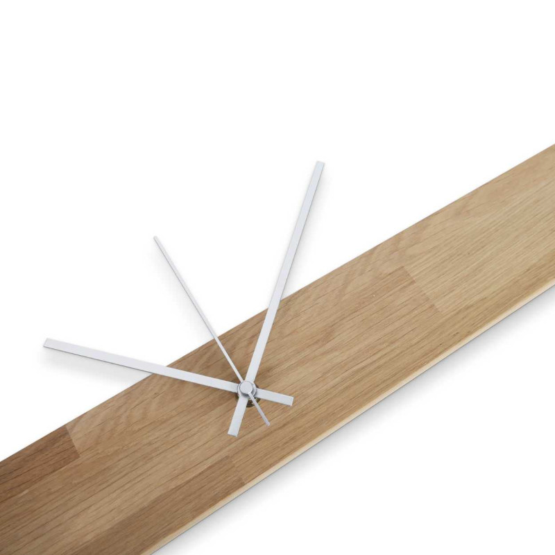 Narrow wooden clock with natural texture and soft shine