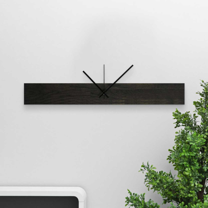 Minimalist wooden clock with a central axis and a clean design
