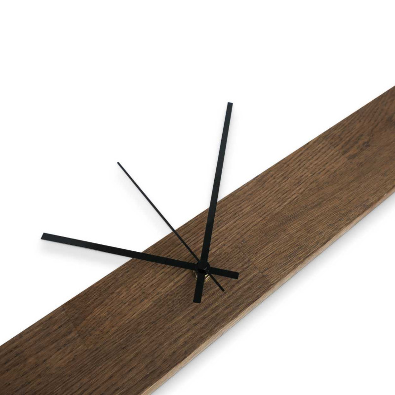 Wooden wall clock with black metal mechanism