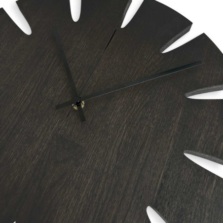 Elegant large wooden wall clock with a simple dial designed for the kitchen. Elegant large wooden wall clock with a simple dial designed for the kitchen.
