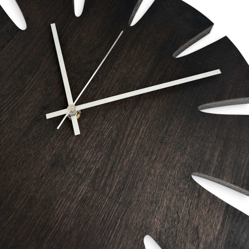 Wooden kitchen clock in a modern style with a simple and easy-to-read dial.