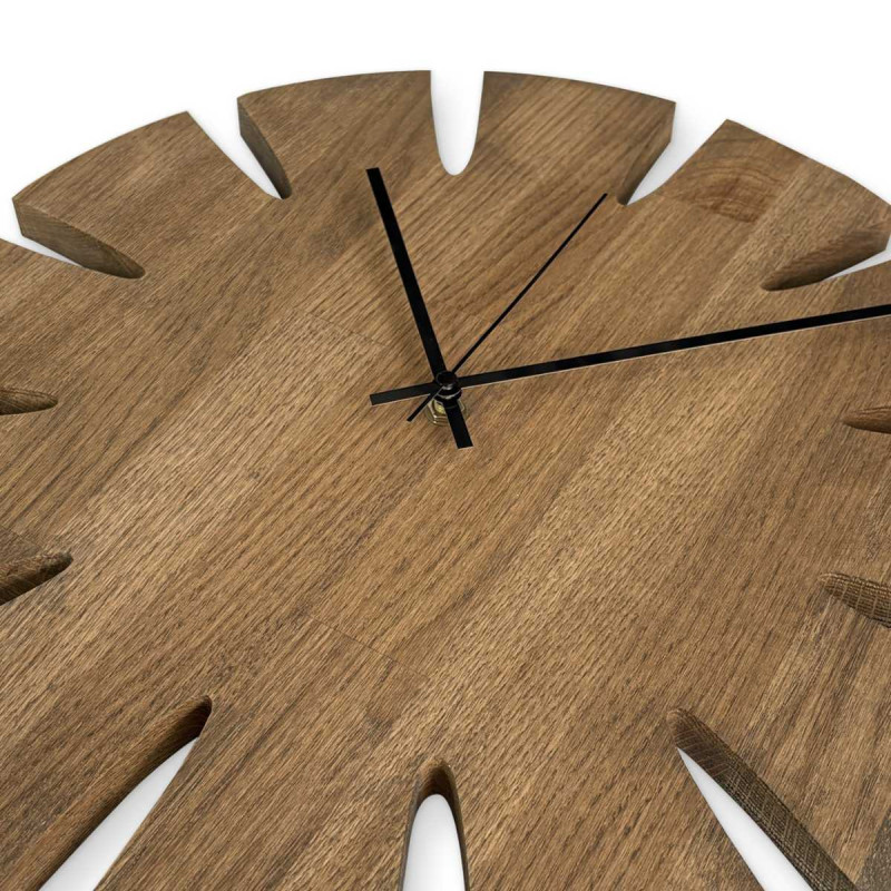 Large wooden clock with a simple dial designed for a modern interior.