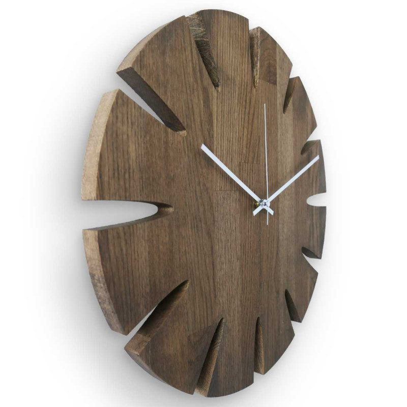 Modern circular wooden clock with a subtle pattern and a clean dial.