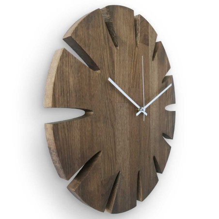 Modern circular wooden clock with a subtle pattern and a clean dial. Modern circular wooden clock with a subtle pattern and a clean dial.