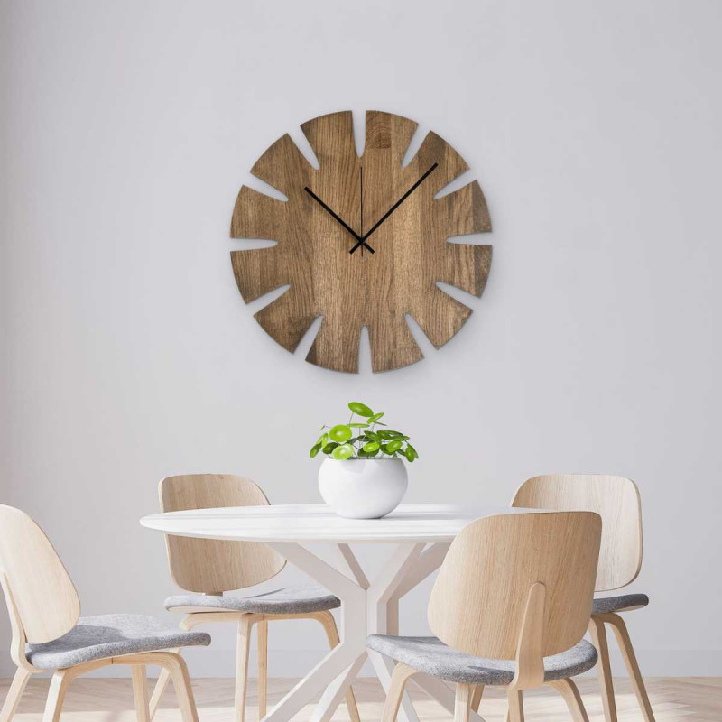 Modern wooden wall clock with a circular shape and minimalist design suitable for the living room.