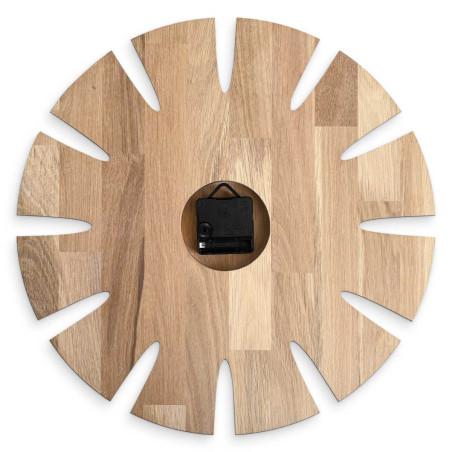 High-quality clock made of wood with an original artistic motif. High-quality clock made of wood with an original artistic motif.