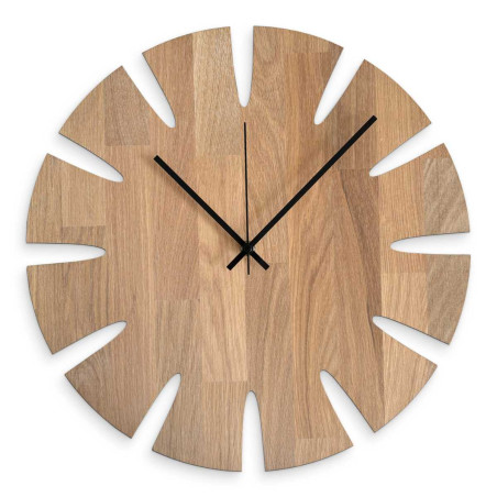 Designer wooden clock with a stylish motif for a modern interior. Designer wooden clock with a stylish motif for a modern interior.