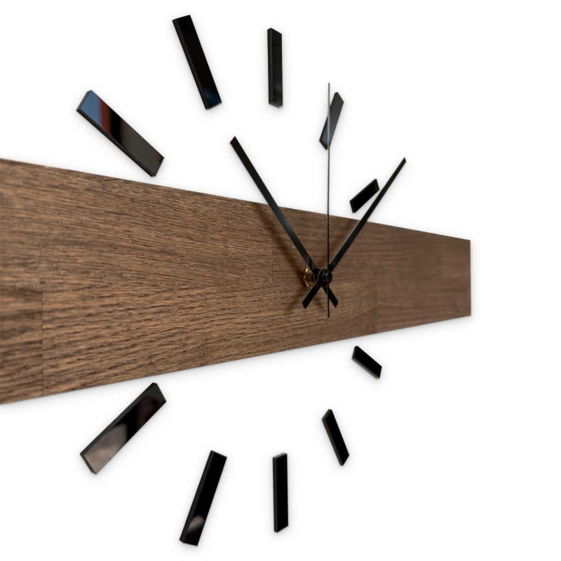 Simple and inexpensive wooden clock as a universal wall decoration.