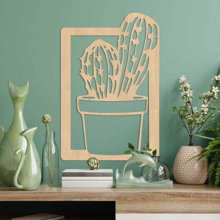 Large wooden wall painting with a carved motif of a cactus in a flower pot. Large wooden wall painting with a carved motif of a cactus in a flower pot.