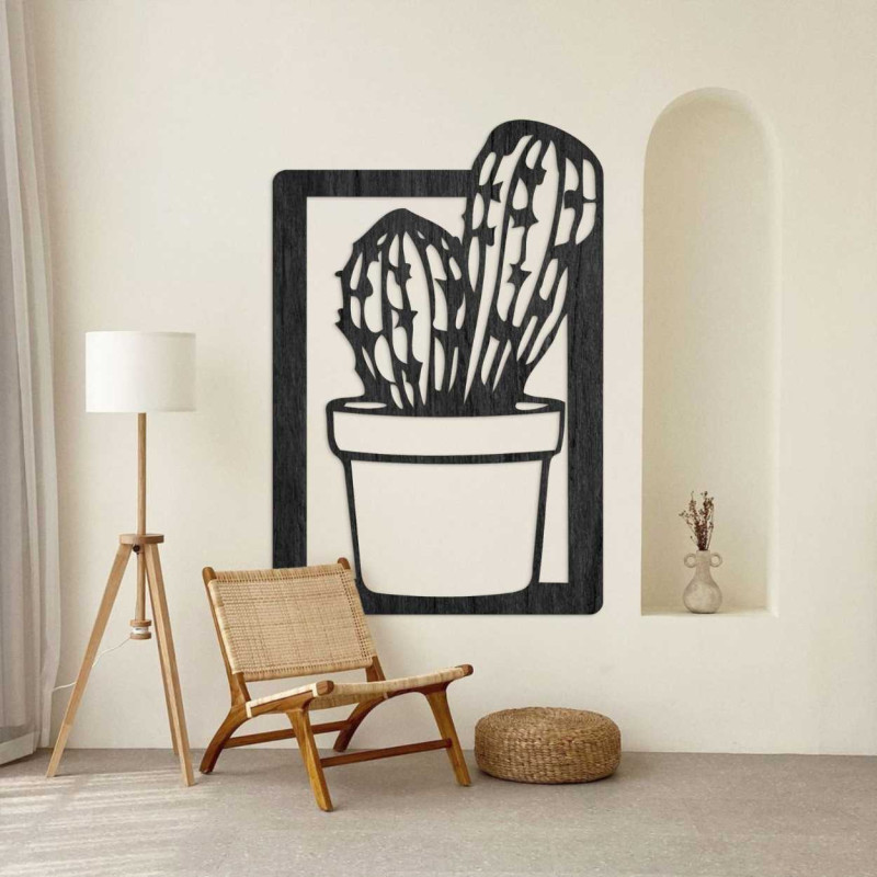 Modern wall decoration for the living room with a wooden frame and a natural cactus motif.