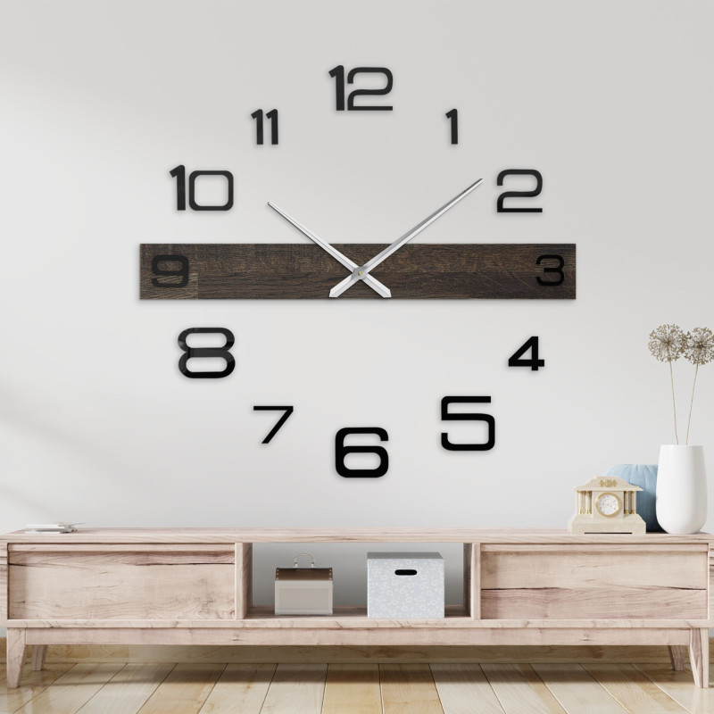 Wooden wall clock with an original design and large black numbers.