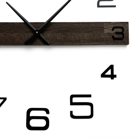 Luxurious wooden wall clock with a minimalist design and contrasting numbers.