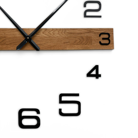 Large wall clock with wooden detail and black plastic numerals, also suitable as a cheap solution. Large wall clock with wooden detail and black plastic numerals, also suitable as a cheap solution.