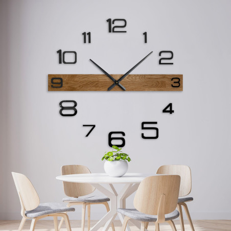 Elegant and modern clock with a wooden center section and black hour markers. Elegant and modern clock with a wooden center section and black hour markers.