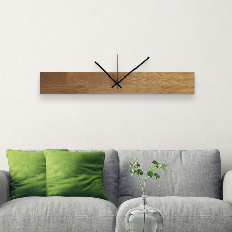 Wooden wall clock with a brown wooden frame and large, black numbers, suitable for the kitchen. Wooden wall clock with a brown wooden frame and large, black numbers, suitable for the kitchen.
