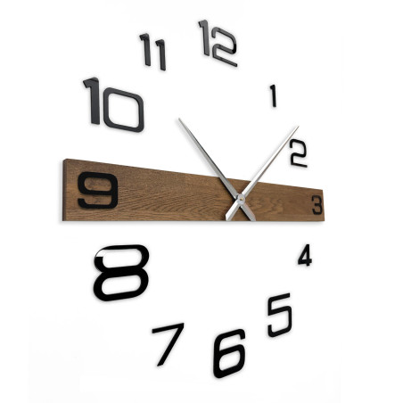 Luxurious wooden clock with a dark wooden band and black Arabic numerals. Luxurious wooden clock with a dark wooden band and black Arabic numerals.