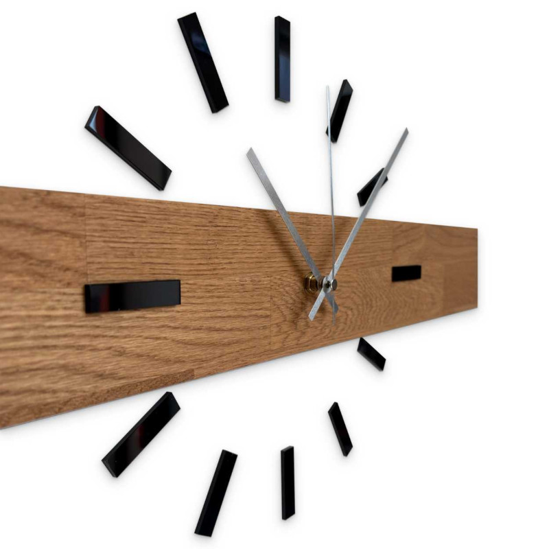 Simple and inexpensive wooden clock as a universal wall decoration.
