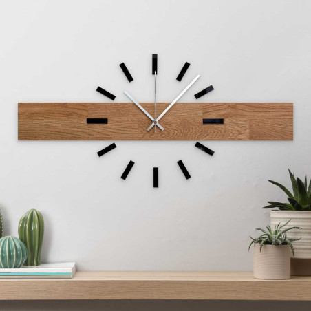 Luxurious large clock made of natural wood as a stylish decoration. Luxurious large clock made of natural wood as a stylish decoration.