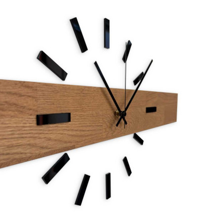 Original wall clock made of solid wood suitable for the kitchen. Original wall clock made of solid wood suitable for the kitchen.