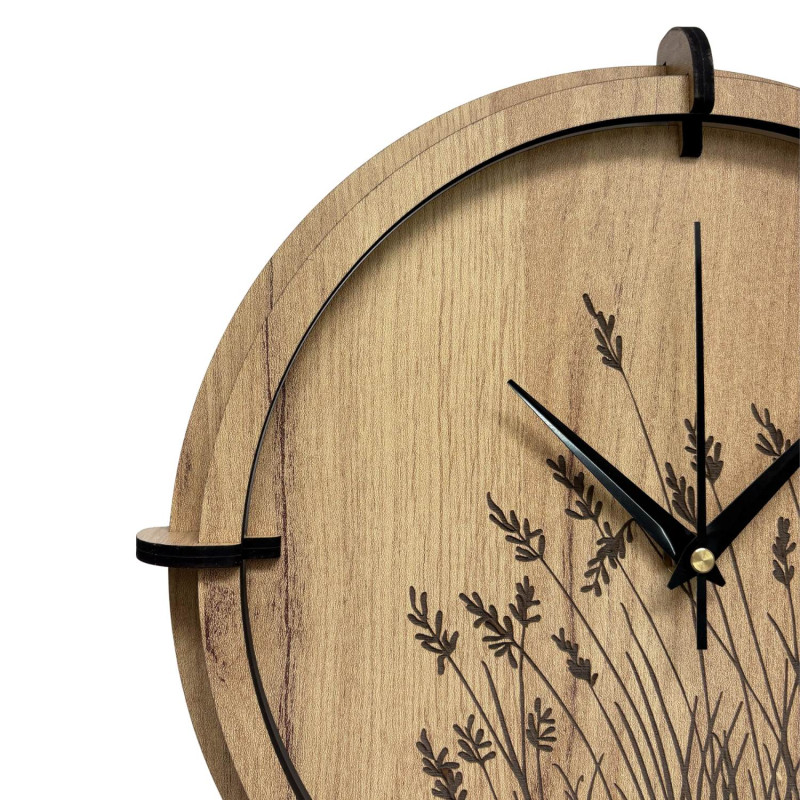 Wall clock made of natural wood with plant pattern