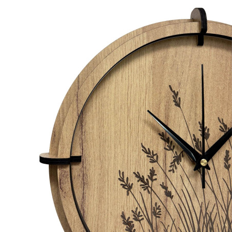 Wall clock made of natural wood with plant pattern